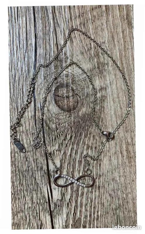 Pendentif symbole infini avec strass imitation argent (image 1)