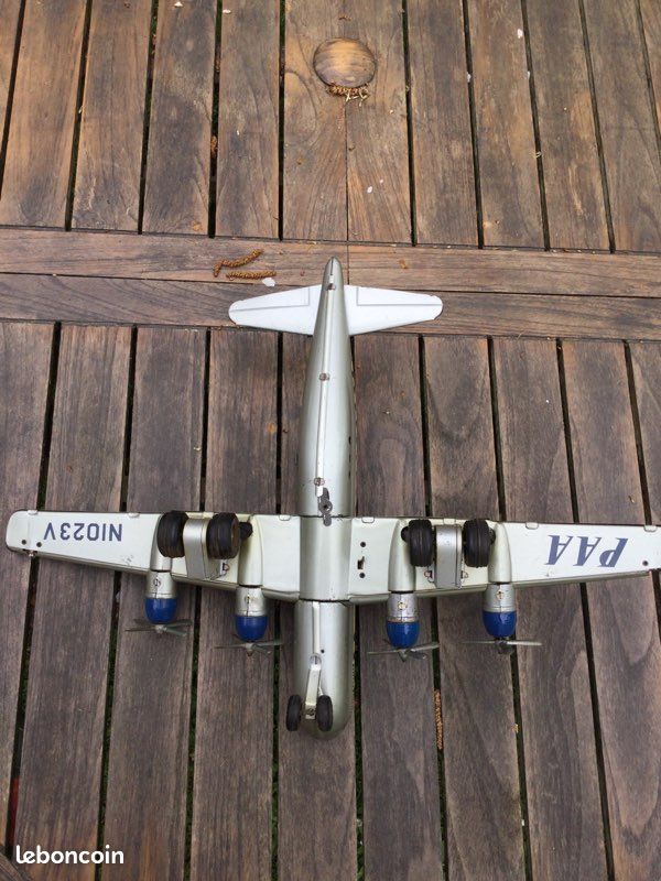Ancien jouet tôle superbe avion quadrimoteur SKYCRUISER