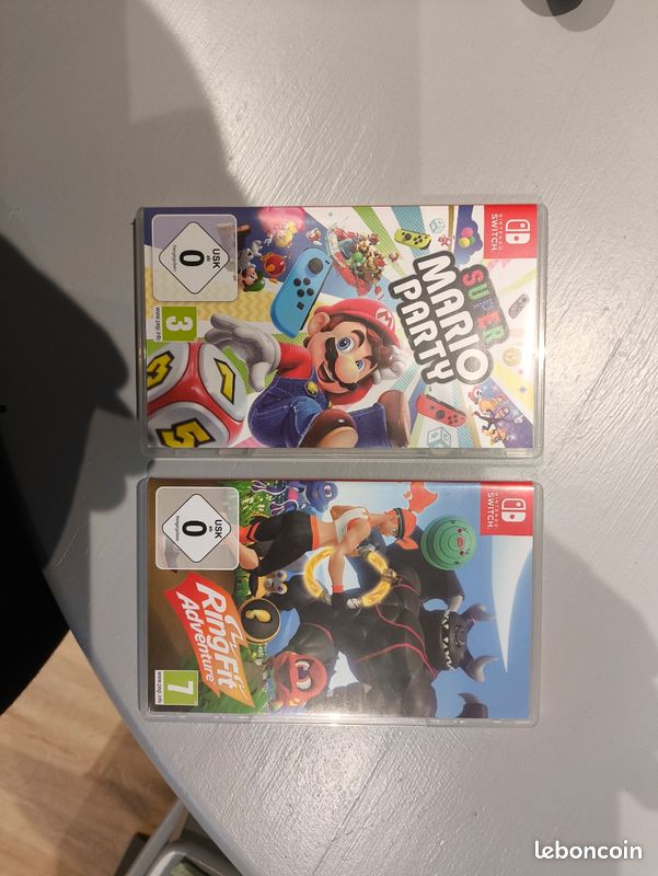 Nintendo Switch + manette pro + 2 jeux + accessoires et sacoche (image 9)