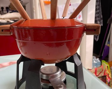 Service à fondue fonte décor alpes