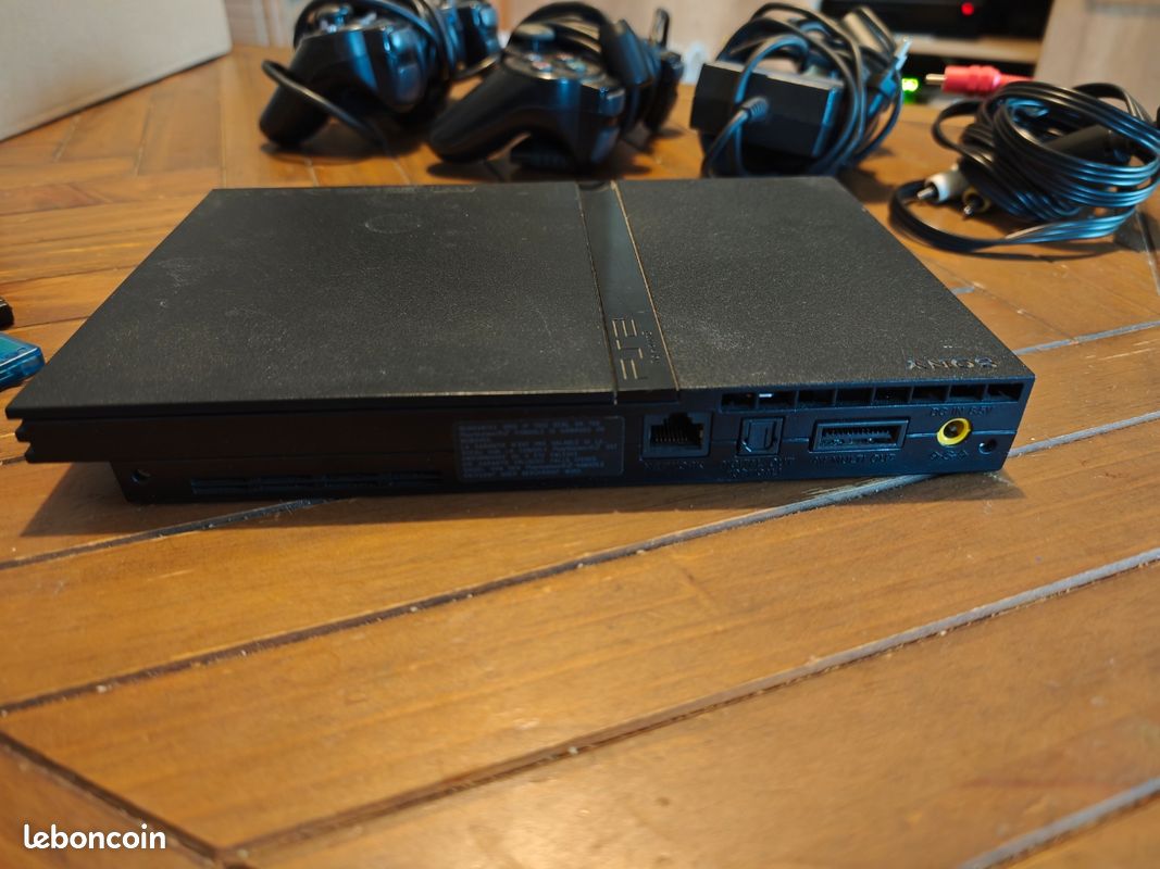 PS2 Slim + jeux (image 3)