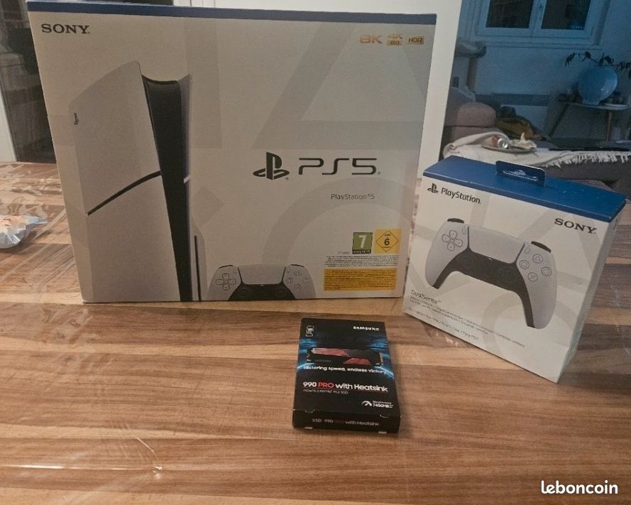 Ps5 slim lecteur de disque+spiderman 2 +ghost of tsushima dlc +casque (image 1)