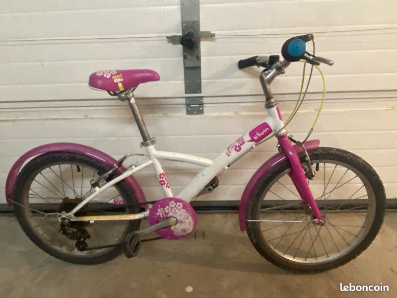 velo fille rose et blanc B-twin 4-6ans/16 pouces