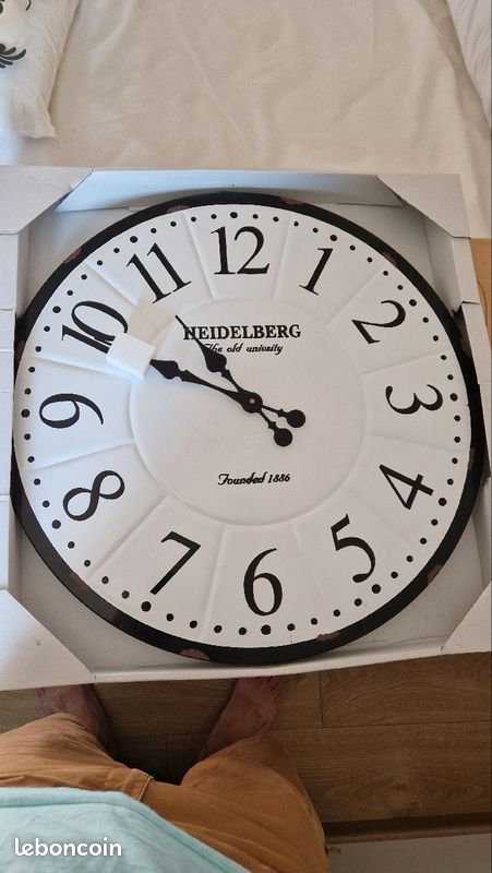 Horloge acier (image 1)