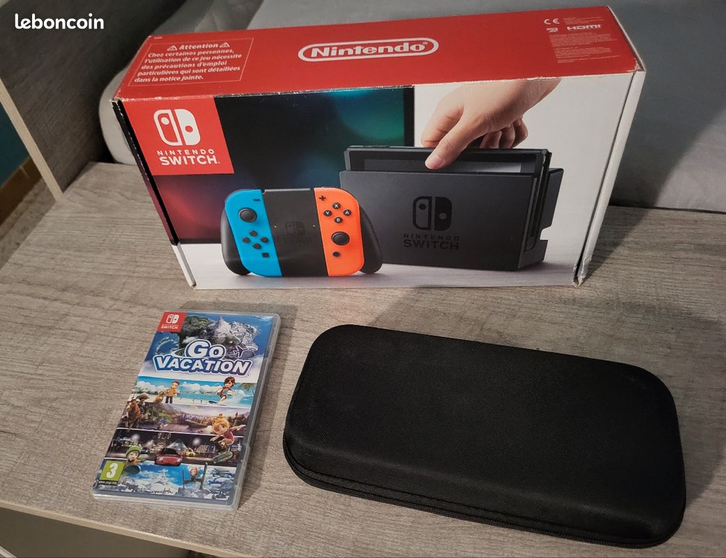 Nintendo switch (accessoires et 1 jeu inclus et petit problèmes avec les manettes) (image 3)