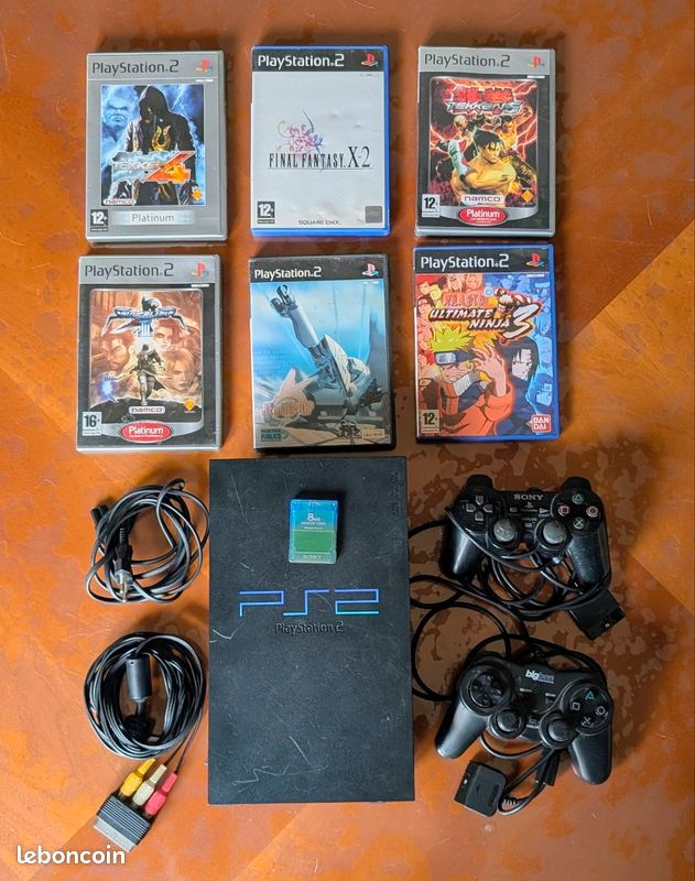 PlayStation 2 , 2 manettes,6 jeux et une carte mémoire officielle (image 1)
