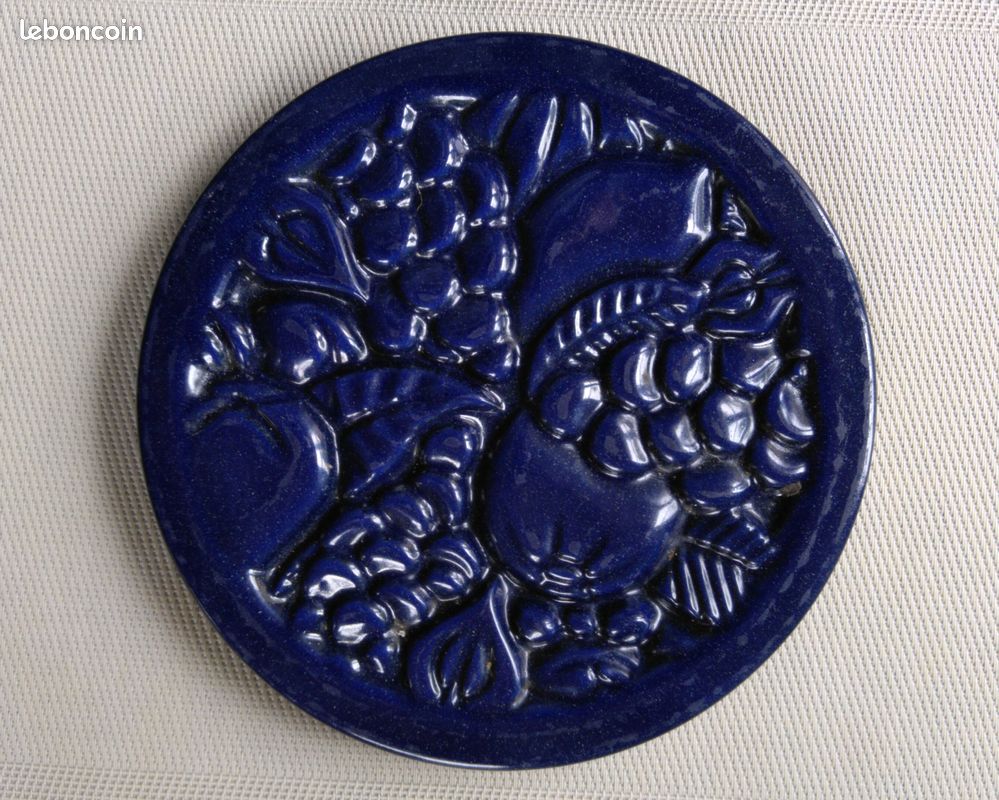 Dessous de plat en fonte à motifs végétaux (image 1)