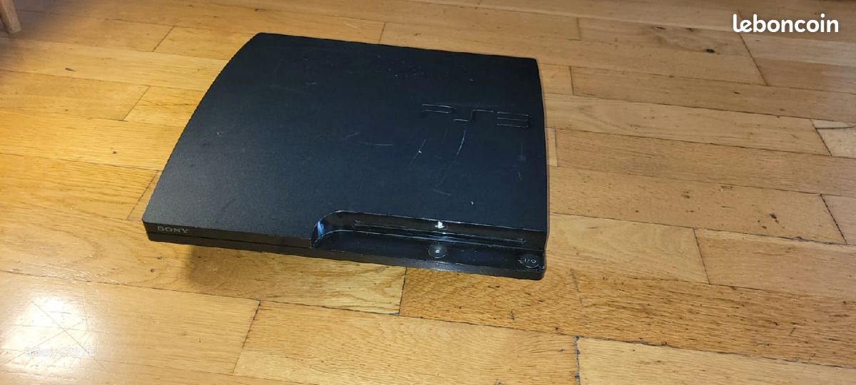 Ps3 slim + 1 manette + 1 manette offerte+lot de 7 jeux (image 3)