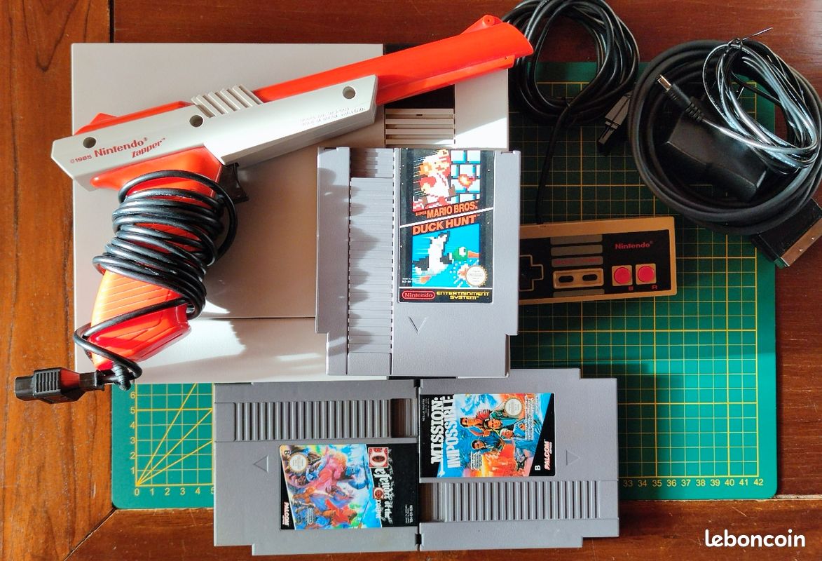 Console NES 3 cartouches manette et pistolet zapper (image 1)