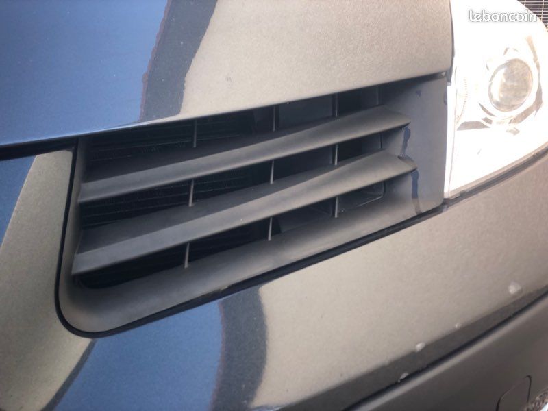 Calandre gauche pare choc avant Renault espace 4 (image 1)