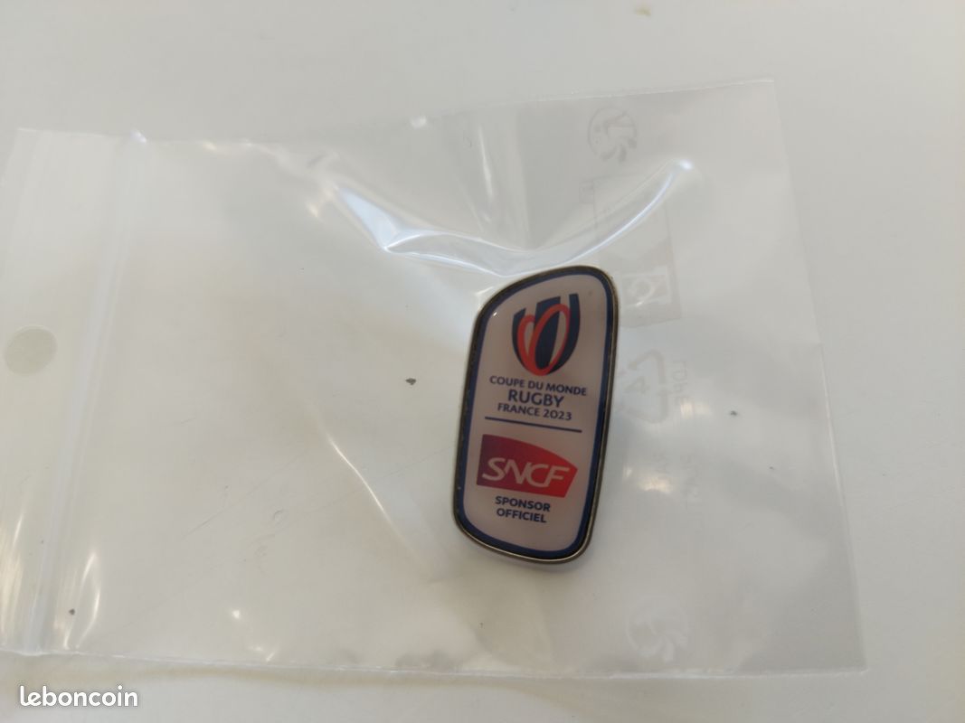 Pin's coupe du monde de Rugby France 2023 - SNCF Sponsor Officiel (image 1)