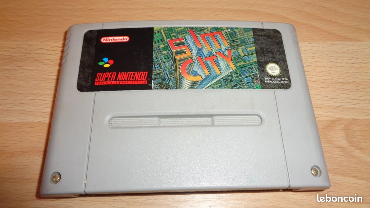 Jeu super nintendo SIM CITY (image 1)