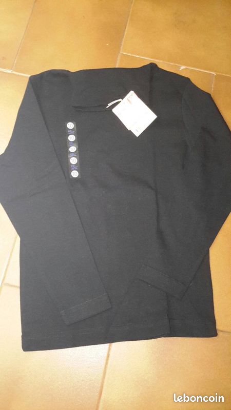 Col roulé DPAM noir NEUF 10 ans slg (image 1)