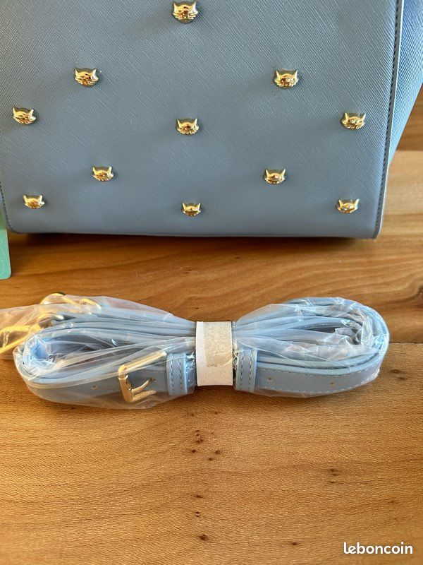 Sac à main bleu ciel chats dorés Vendula London Avec bandoulière 