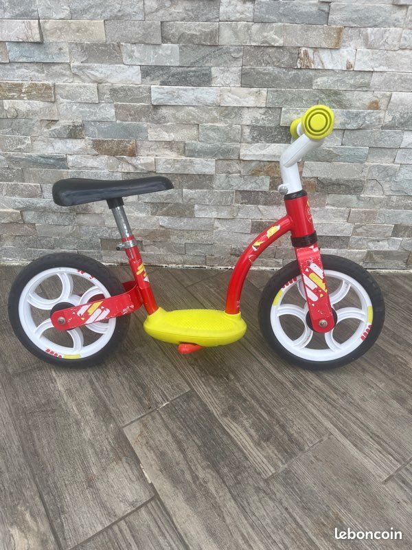 Vélo sans pédales bébé jaune et rouge – bon état (image 1)