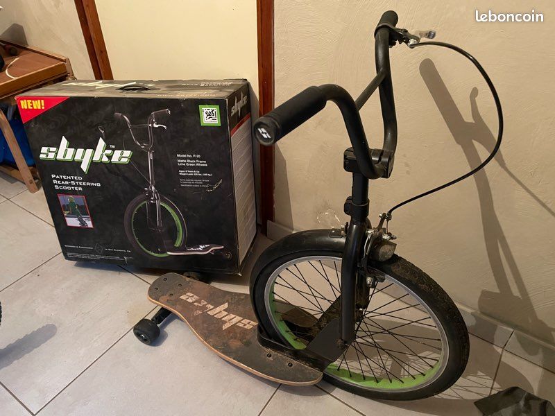 Bike scooter skateboard sbyke skateboard bike Sbyke is a mash-up of a bike, a scooter and a skateboard