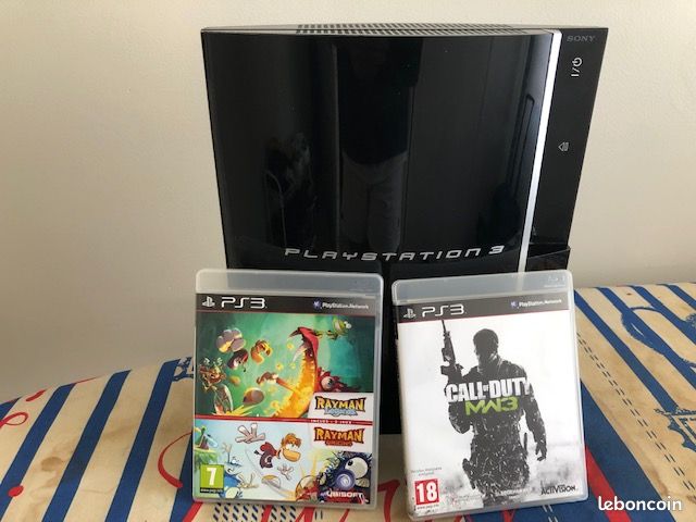 PS3 + 2 jeux avec problème d éjection de disc (image 1)