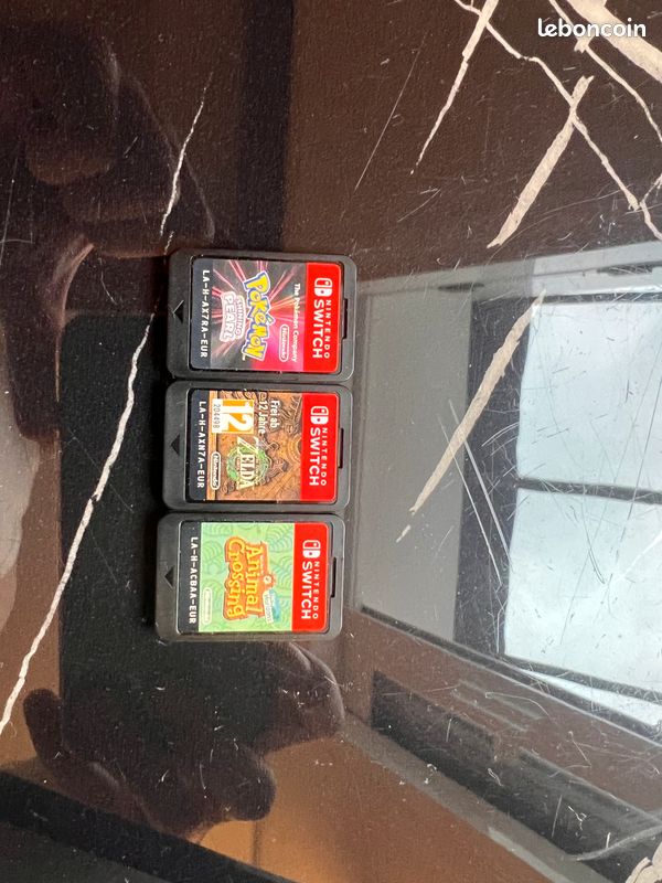 Nintendo Switch OLED blanche + manette Pro + 3 jeux (Zelda TOTK, Animal Crossing, Pokémon) (image 9)