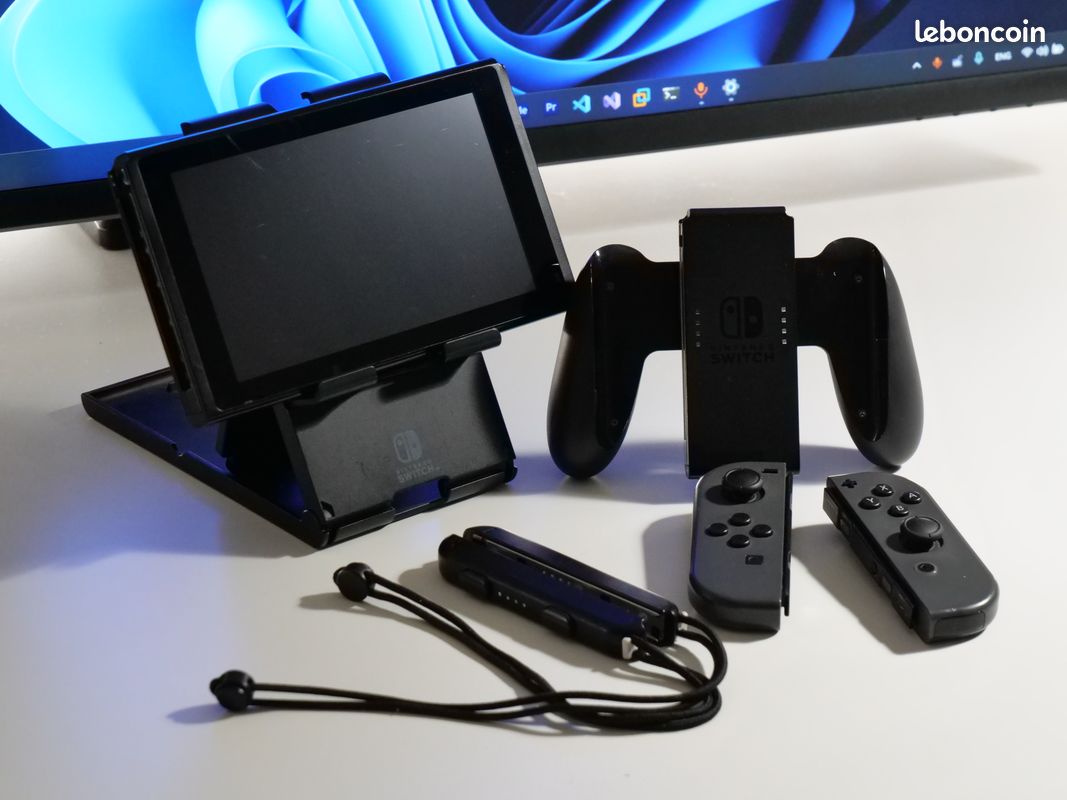 Nintendo Switch | Joy-Cons + Support (image 1)