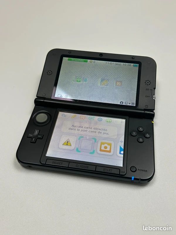 3DS XL + housse donkey kong + chargeur (image 1)