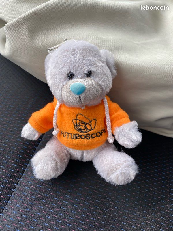 Peluche ourson Futuroscope parc d'attraction gris sweat orange 22 cm - Jeux & Jouets