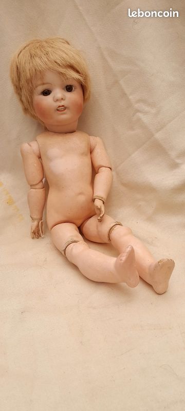 TETE DE POUPEE ANCIENNE A TROIS FACES EN PORCELAINE
