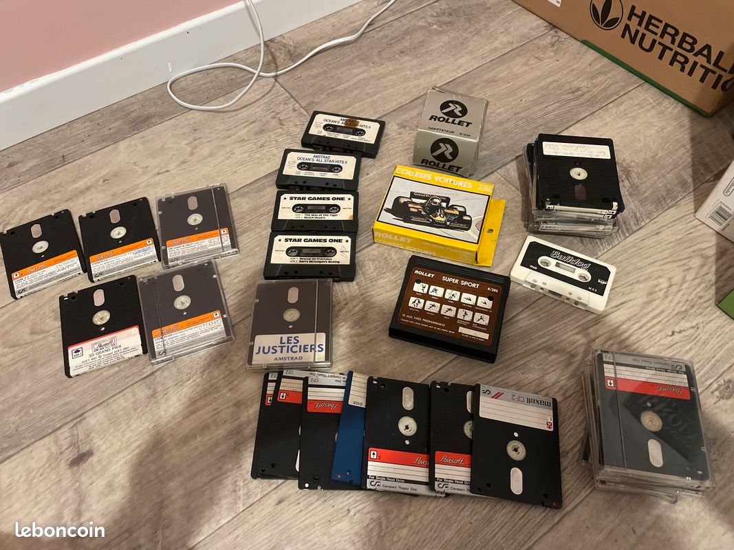Lot cassettes disquettes Amstram et Rollet (image 1)