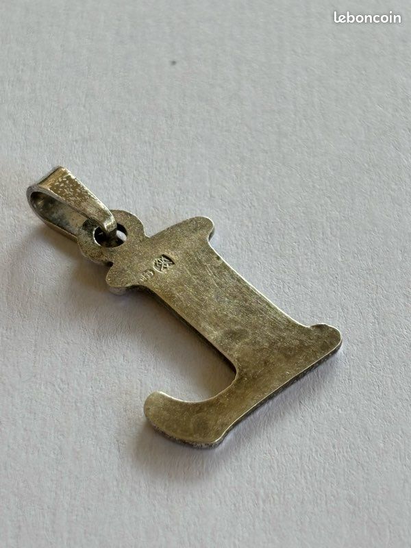 Pendentif d'Oeil d'Horus en Métal Argenté avec une pierre