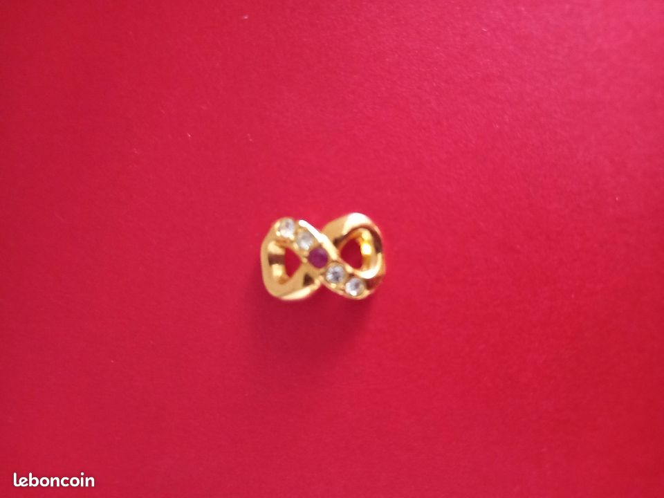 Pendentif fantaisie signe infini (image 1)