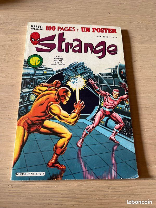 Lug, strange 174 avec son poster (image 1)