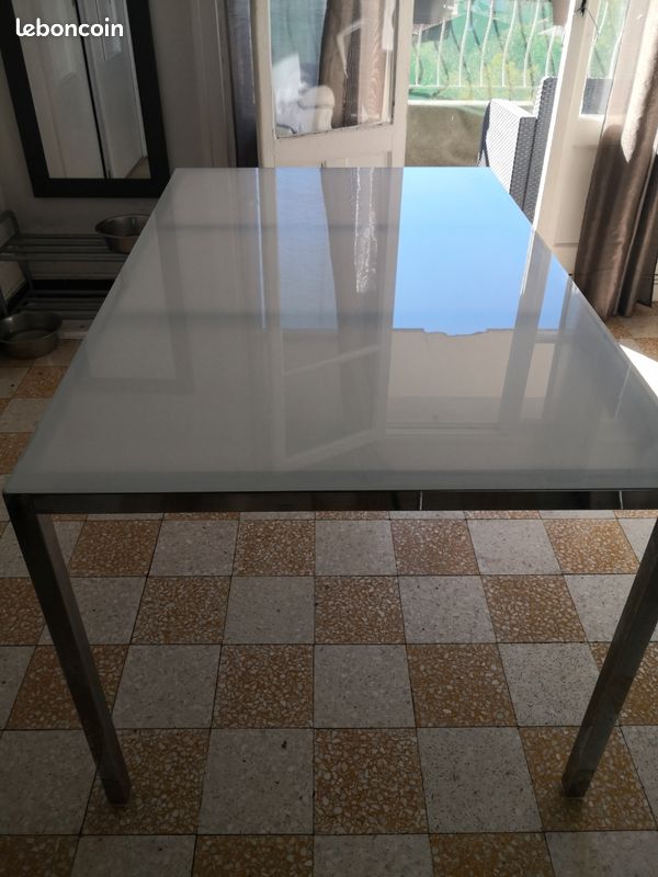 Vends table plateau en verre, pieds inox 135/85 cm (image 1)