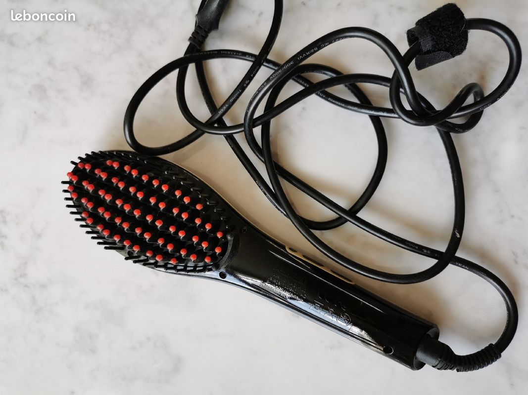 Brosse lissante chauffante (image 1)