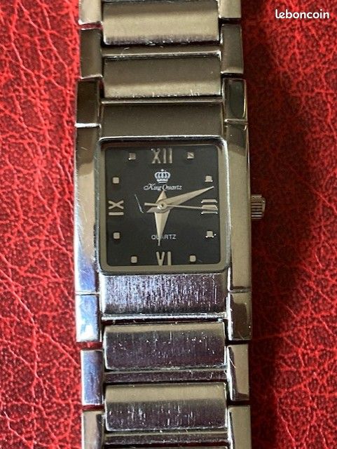 Montre Femme King Quartz à Quartz - Boîtier Argenté, Cadran Noir - Pile Incluse