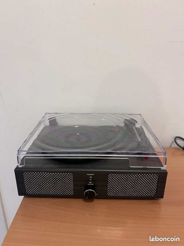 Platine vinyle avec haut-parleurs intégrés, fonctionne bien (image 1)