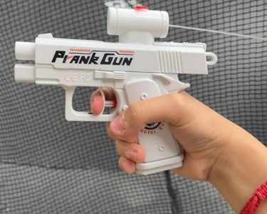 Pistolet à Eau Double Sens – Arroseur Blague à Pulvérisation Inverse, Gadget Farce Pour Enfants Et Adultes – Blanc