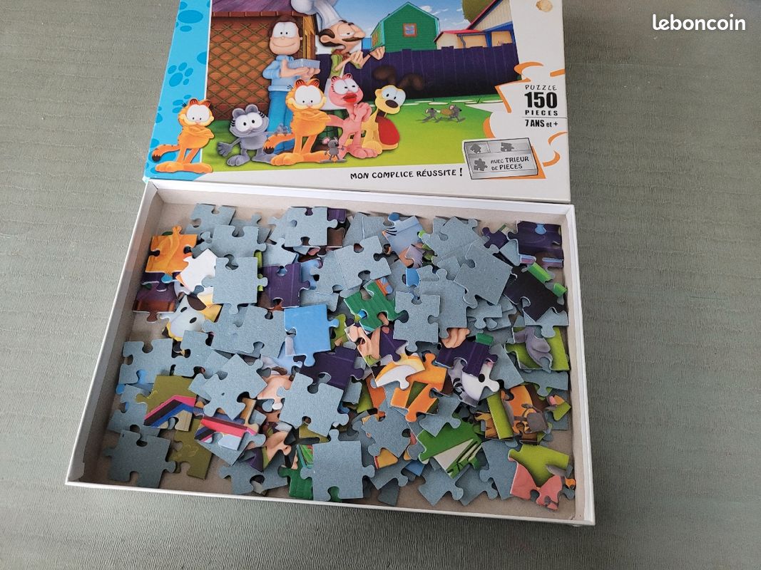 Puzzle garfield -150 pièces- parfait etat (image 1)