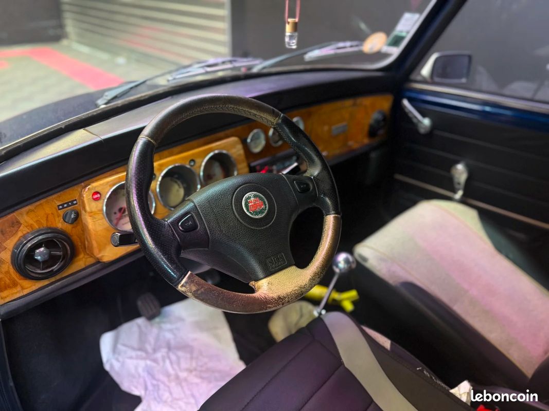 ROVER MINI 1.3i Sport For Ever -Origine France - Boitier injection - Airbags - Jantes anniversaire - Historique d'entretien (image 8)
