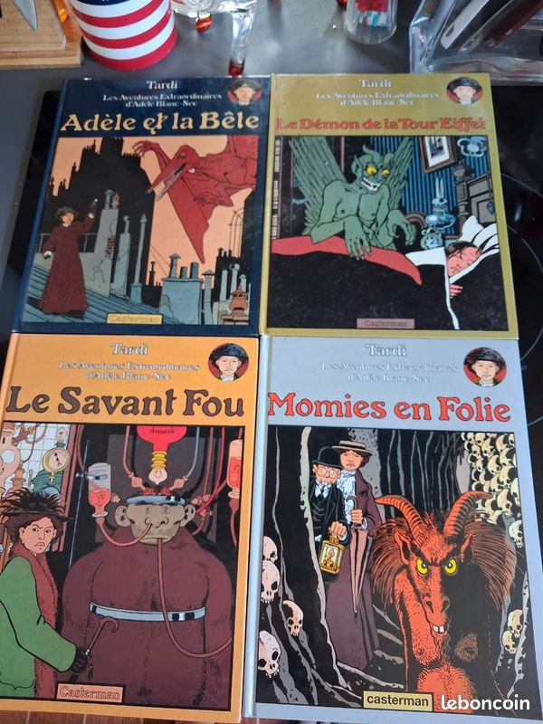 Adele Blanc-Sec par Tardi . Le Savant fou, le Démon de la tour Eiffel, Adèle et la bête, Momies en folie. EO (image 1)