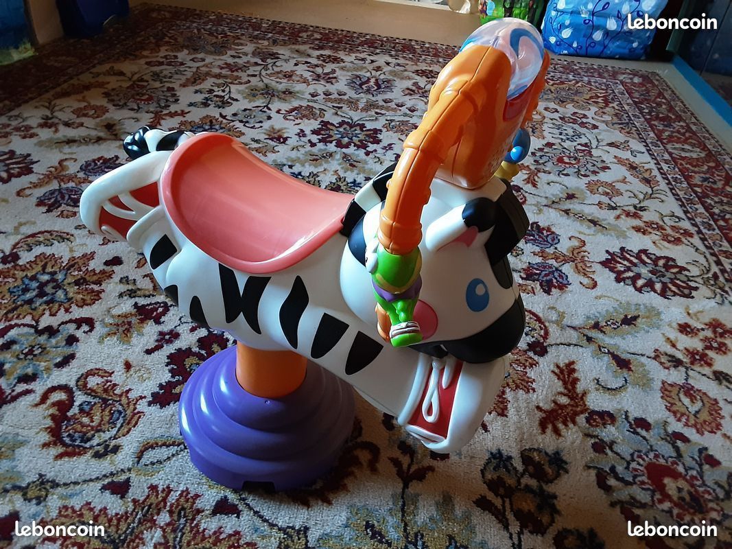 Zèbre tourni-rebond fisher price dès 1 an (image 1)
