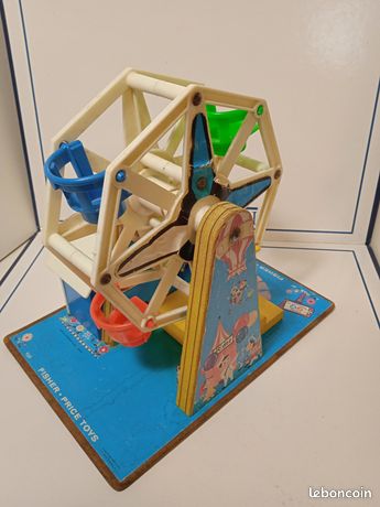 Mobile musical Fisher Price - jouets rétro jeux de société figurines et