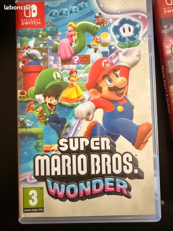 Nintendo Switch classique + 3 jeux – Très bon état (image 2)