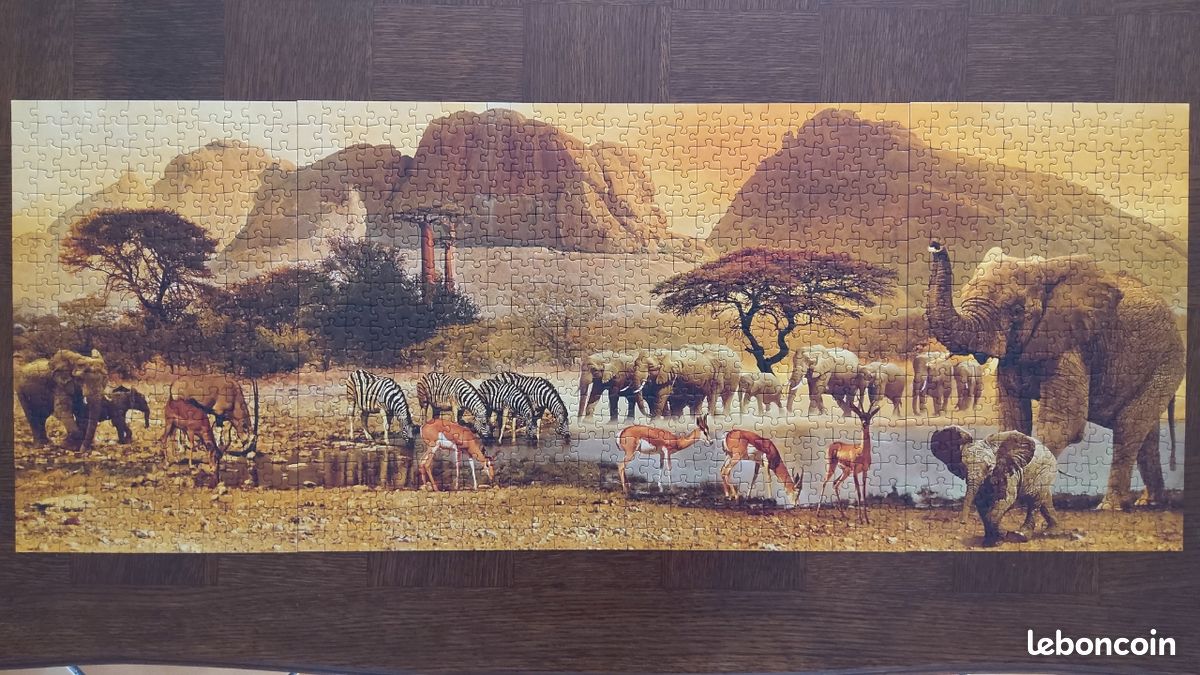 Puzzle 1000 pièces : Animaux autour d'un point d'eau - Puzzle Schmidt Puzzle 1000 pièces : Animaux autour d'un point d'eau - Puzzle Schmidt