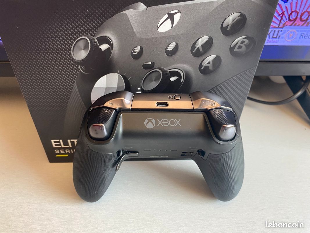 Xbox séries S +manette elite series 2+59 jeux fc25 red dead redemption 2 gta tomb raider goat simulator man eater flight simulator jeux de voiture action role et bien plus (image 6)
