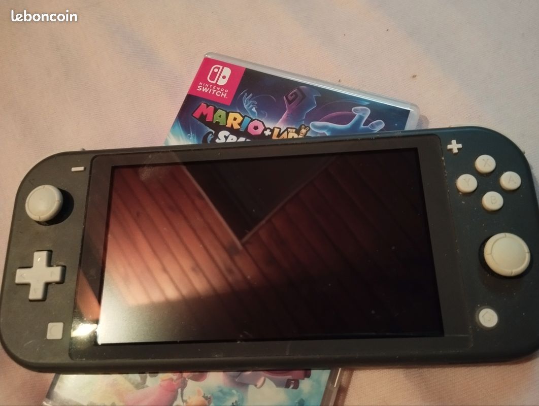 Switch lite grise avec jeu mario (image 2)