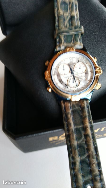 Montre serie limitee lunette or jaune 18 carats neuve jamais