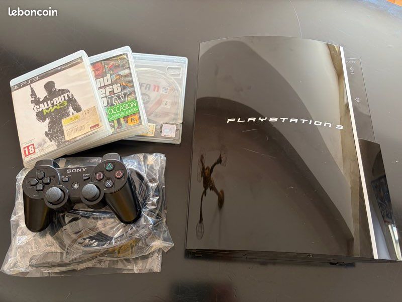 PS3 Fat 500Go + 3 jeux (image 1)