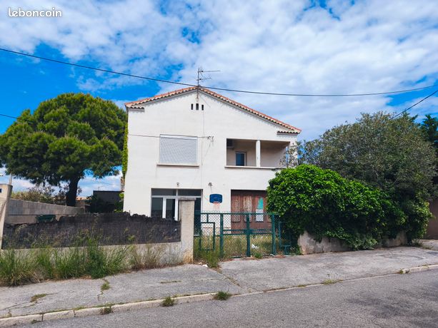 Grande maison de plusieurs appartements avec fort potentiel