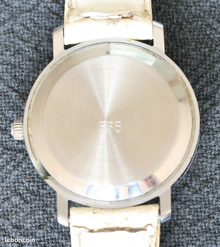 Raketa Copernic vintage Montre mécanique russe Cadran blanc et doré (image 7)