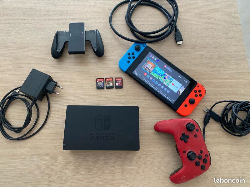 Pack Console Nintendo Switch Standard + 2 Jeux + Manette Pro Rouge - Très bon état (image 1)
