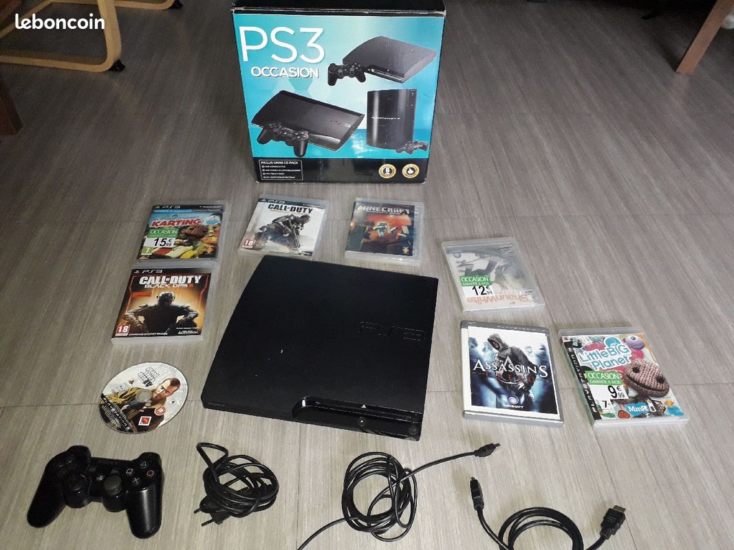 PS3 Slim + 7 Jeux (image 1)
